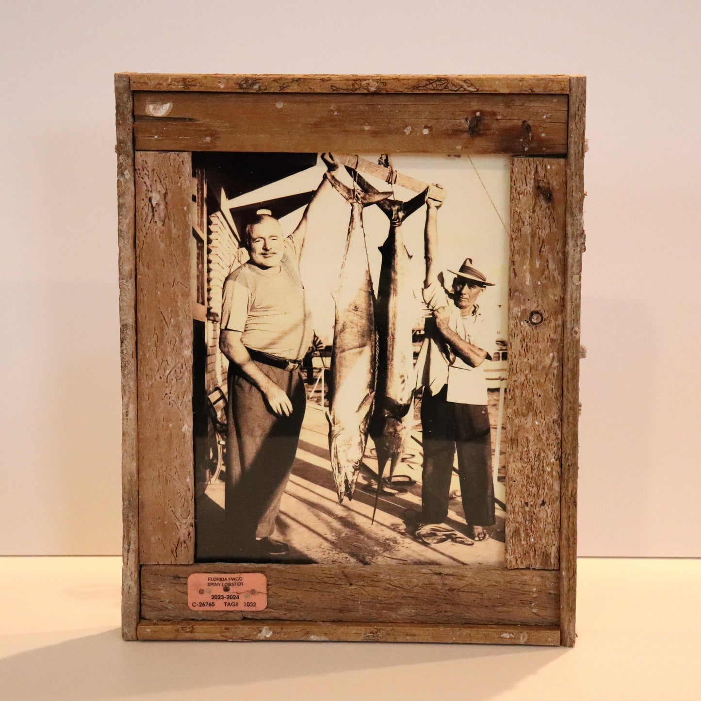 Hemingway and Gregorio Fuentes in Lobster Trap Frame