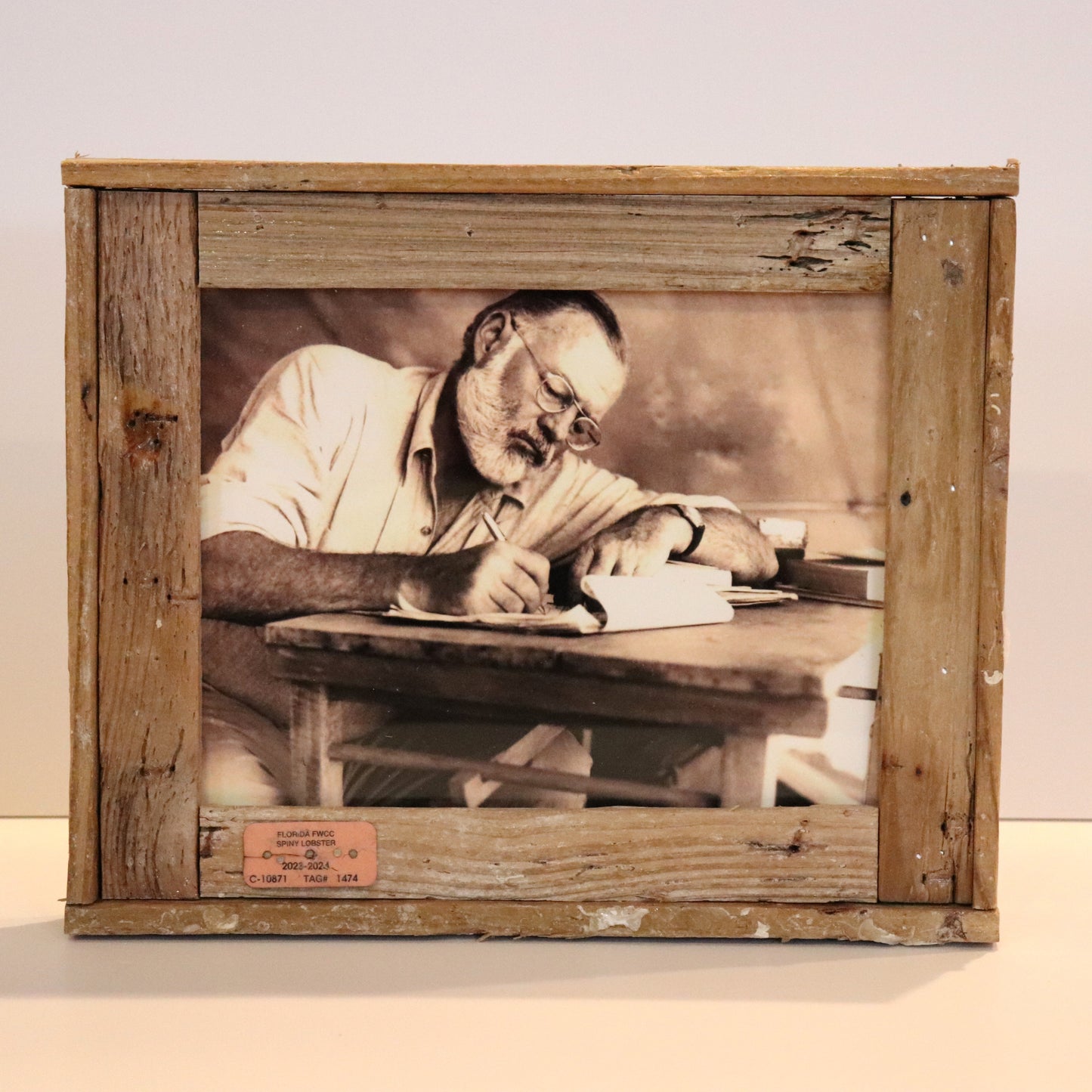 Hemingway at his desk Writing Photo in Lobster Trap Frame