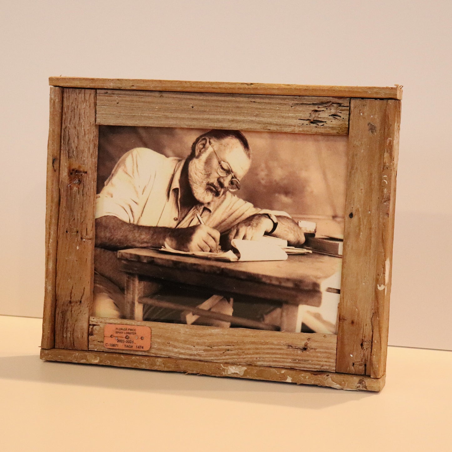 Hemingway at his desk Writing Photo in Lobster Trap Frame